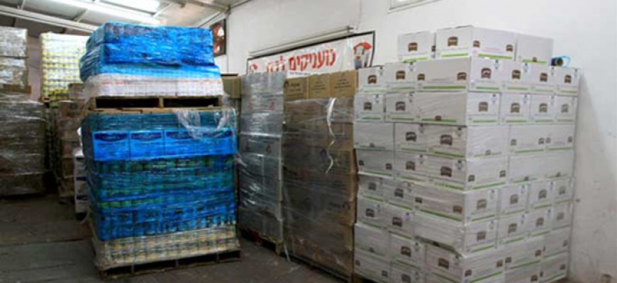 חבילות "קמחא דפסחא" חולקו למאות משפחות נזקקות בחולון ובת ים